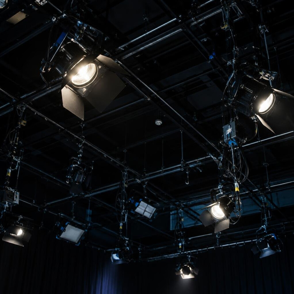 Studio ceiling with hanging spotlights and rigging